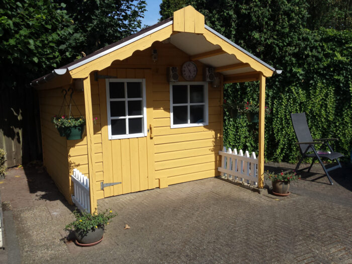 outdoor shed in yellow paint
