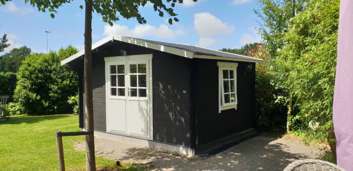 staining a treated garden house
