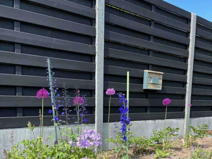 pine fence painted black