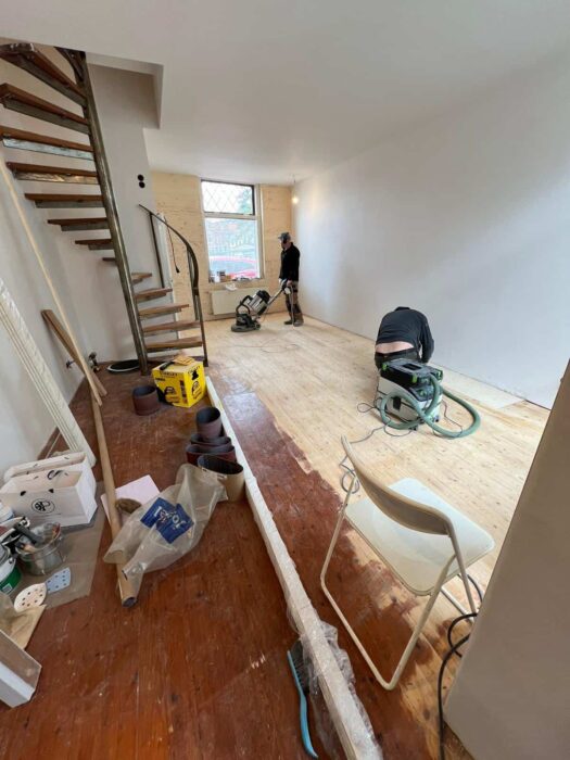 sanding a wooden floor